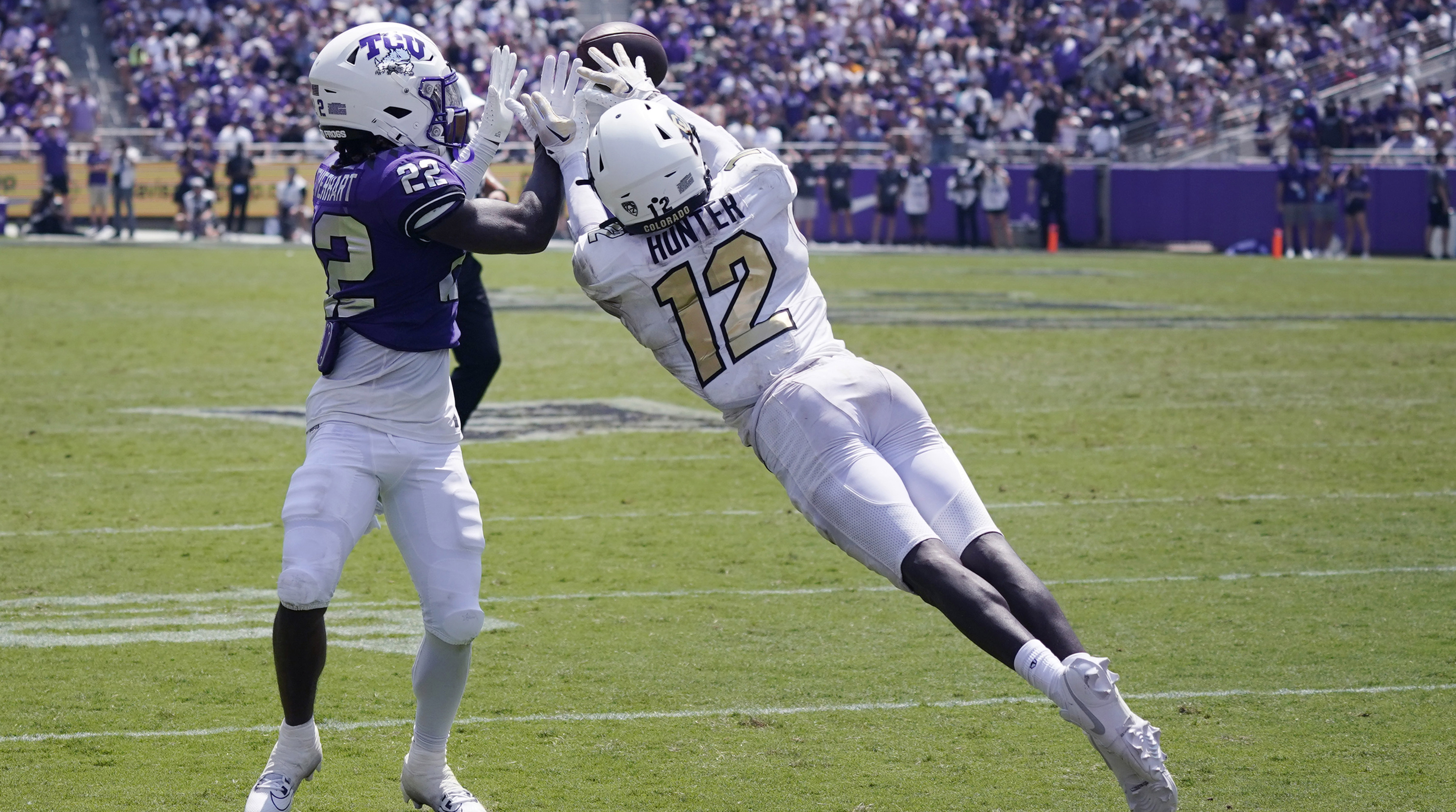 Colorado cornerback Travis Hunter jumps to intercept a pass against TCU.